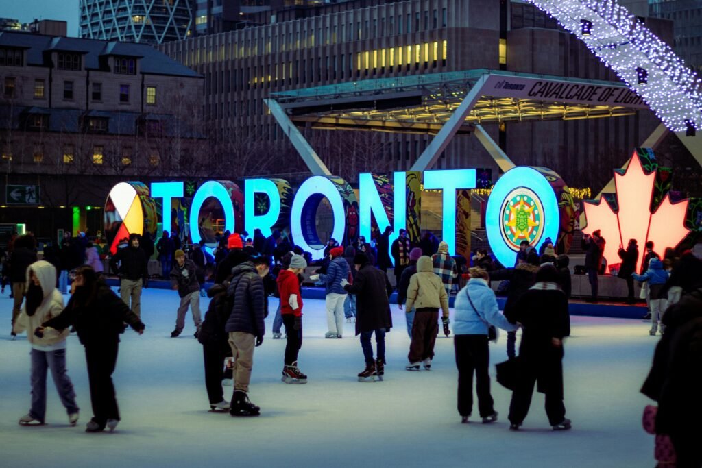 People ice skating at Nathan Phillips Square in Toronto, symbolizing how public visibility and first impressions shape online reputation.